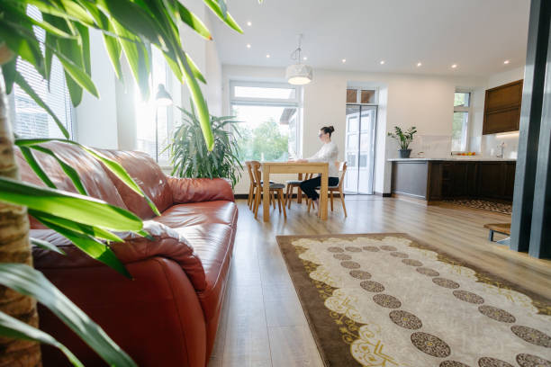 istock Woman working in modern private home interior 2150918736