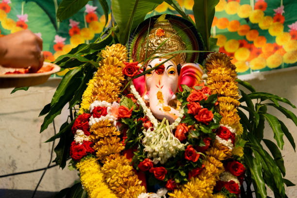 istock Hindu God Ganasha with Flower Petals 2150919004