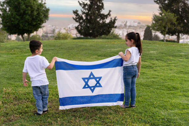 istock Happy children holding Israel flag. 2150922357