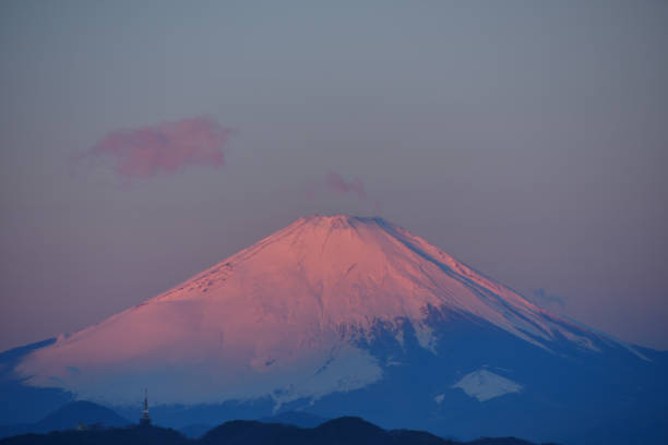 istock Mount Fuji glows pink in the morning sun. 2150922426