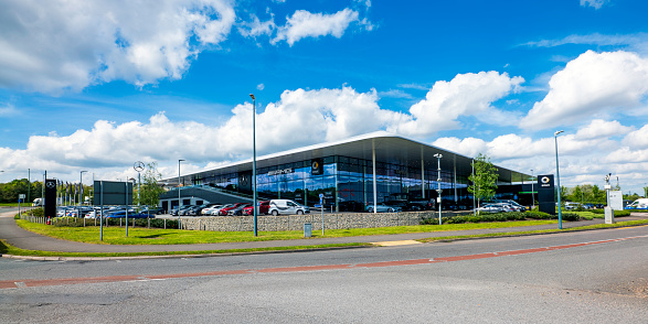 Exterior photographs of the exterior of Mercedes-Benz of Dartford on a bright sunny day in April 2024.