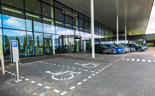 Exterior photographs of the exterior of Mercedes-Benz of Dartford on a bright sunny day in April 2024.