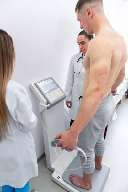istock Health checkup in progress, a medical professional operates advanced diagnostic equipment 2150923738