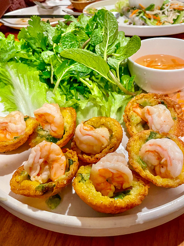 Close up shot of the Banh Khot mini pancake with shrimp dish