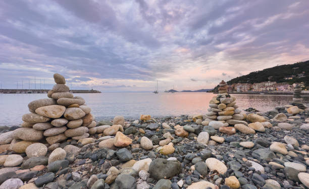 Elevated view of rugged coastline, cliffs and sea at sunrise, Corsica
