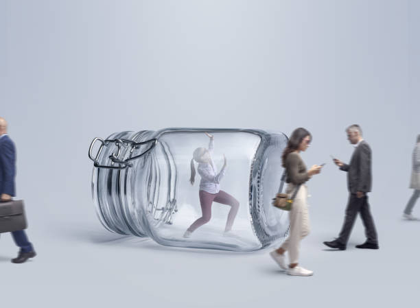 istock People ignoring a woman trapped inside a jar 2150925377
