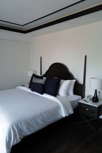 Bedroom interior with low lighting.