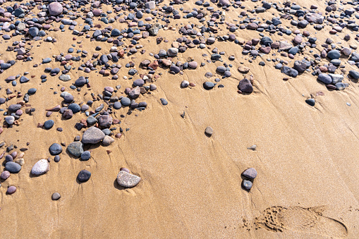 Colored Pebble Beach Texture Background, Sand and Rocky Pattern, Red Morocco Beach, African Coast, Pebble and Sand Mockup, Stone Shoreline, Copy Space