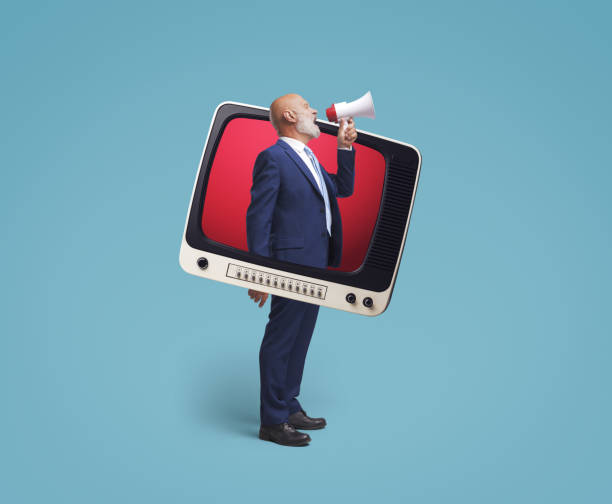 istock TV presenter shouting inside a vintage television 2150927866
