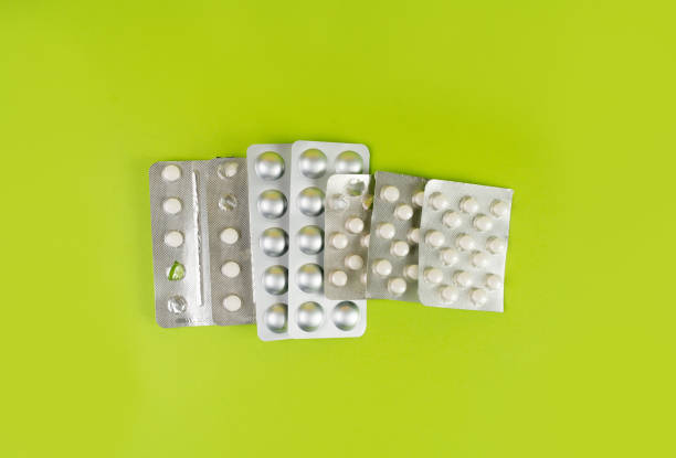 istock Pill Blister on Color Background, Silver Medicine Capsule Package, Drugs Packaging, Pill Pack 2150927919