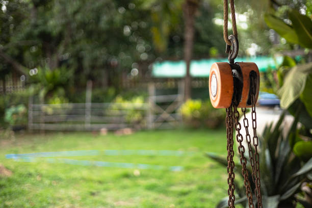Rusty industrial chain hoist for reduce working load and lifting heavy object.