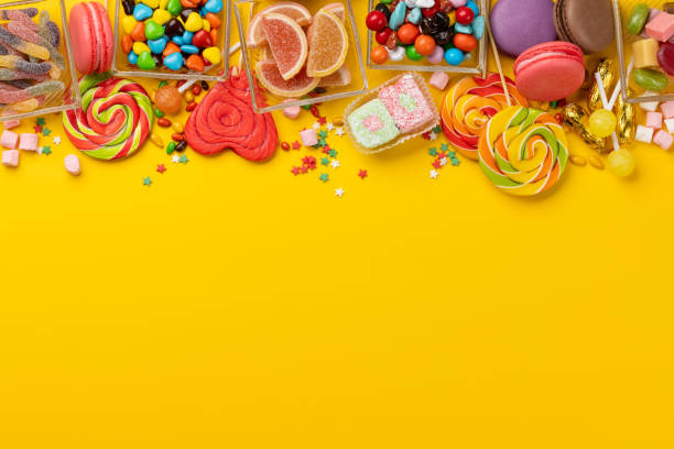 istock Various colorful candies, lollipops, and macaroons 2150930142
