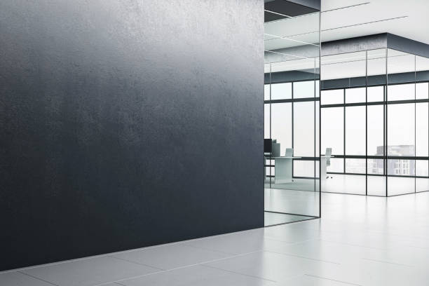 istock Modern office interior with empty wall and glass partitions, suitable for mockups and branding, on a light background with space for a logo or company name. 3D Rendering 2150931364