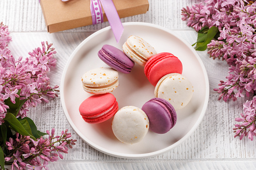 Colorful macaroons, arranged in a delightful display of vibrant hues and irresistible sweetness