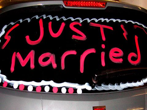 Just married sign written on car rear windshield. Toronto, Canada.