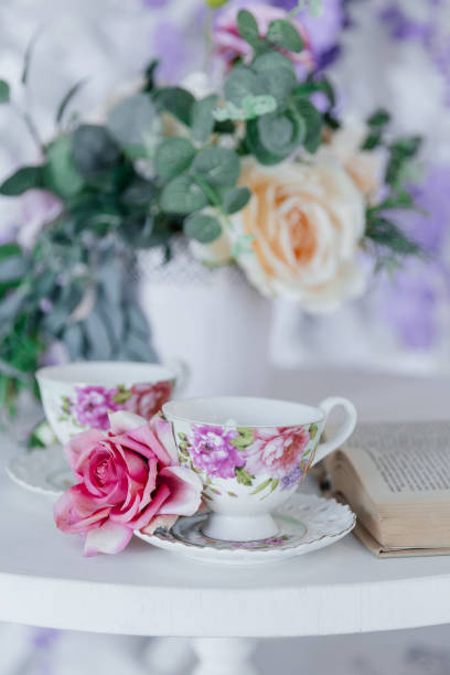 istock Tea couple on a flower-decorated table tea party 2150937693