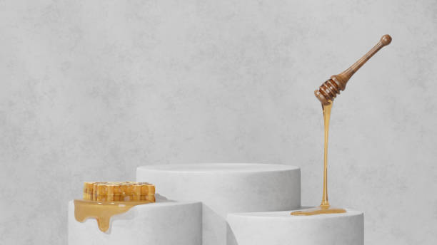 istock 3D background display stand with honey on concrete for product presentation 2150941213