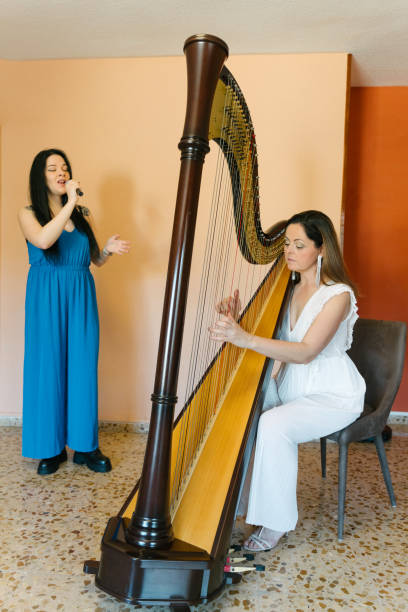 istock Harp and voice duo rehearsing together 2150942574