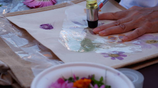 istock Eco print on fabric with fresh flowers. 2150943437