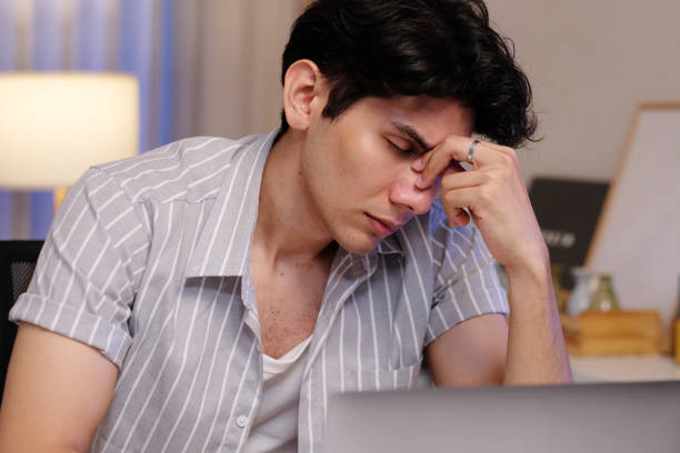 istock Man stressed, exhausted frome work at night, people negative expression 2150943604