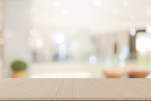 istock abstract blur luxury interior hotel corridor background with perspective wood table counter for show and promote and design content on display concept 2150945524