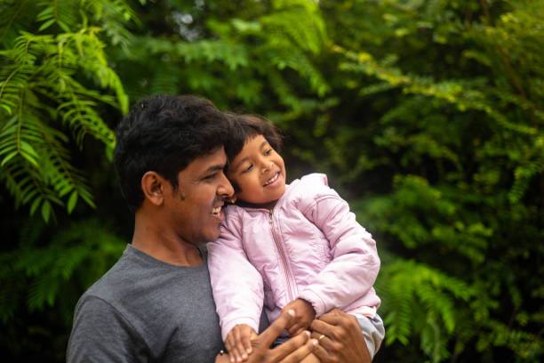 istock Indian Father and Daughter Smiling in Park 2150950667