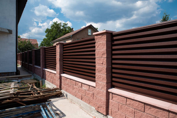 istock Metal fence blinds with brown brick columns 2150953129