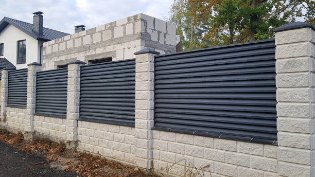istock Modern stone fence with metal shutters 2150953161