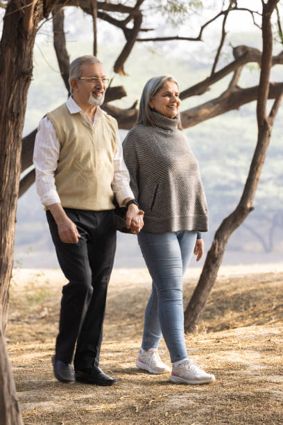 istock Happy senior couple spending leisure time in park during weekend 2150953398