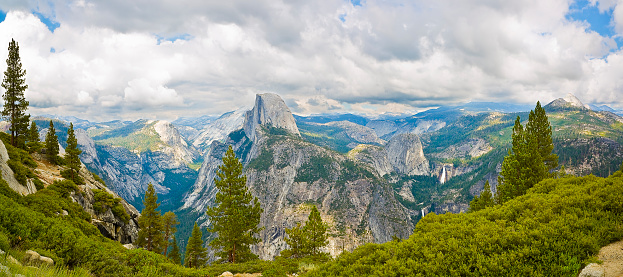 Scenic panoramic view of famous Yosemite Mountains; Half Dome from the Glacier point view - Yosemite National Park - California - USA