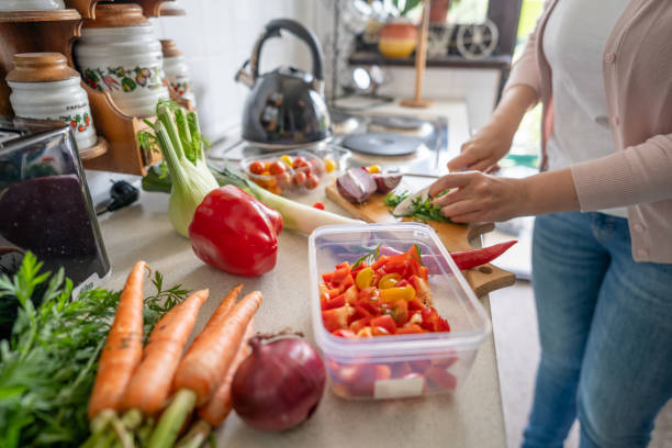 istock Unrecognizable person preparing fresh salad 2150956920