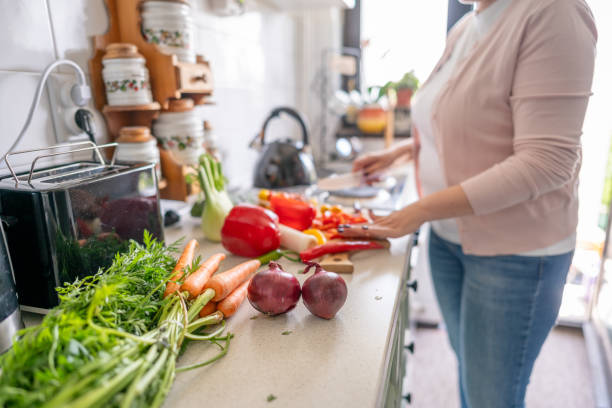 istock Unrecognizable person preparing fresh salad 2150957109