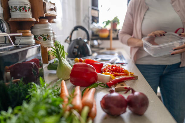 istock Unrecognizable person preparing fresh salad 2150957292