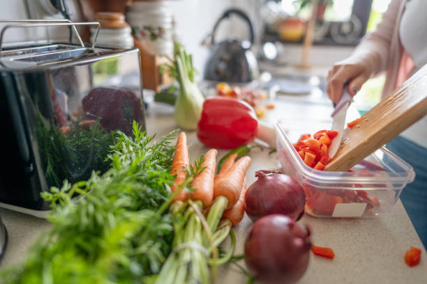 istock Unrecognizable person preparing fresh salad 2150957351