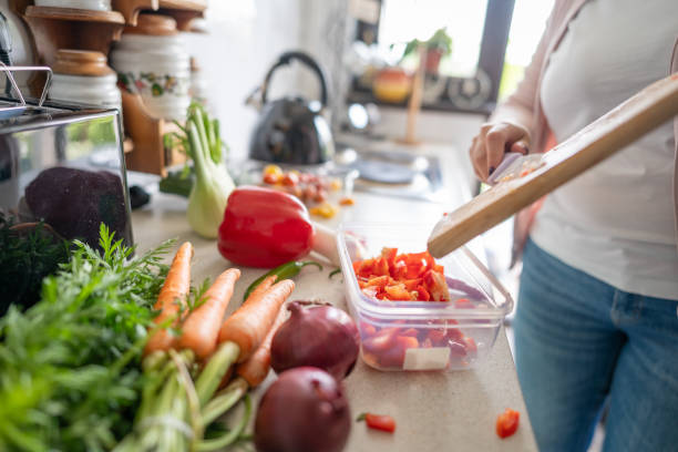 istock Unrecognizable person preparing fresh salad 2150957429