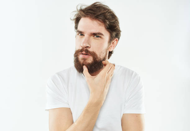 istock Young man in white t-shirt emotions model gesturing with hands 2150957579
