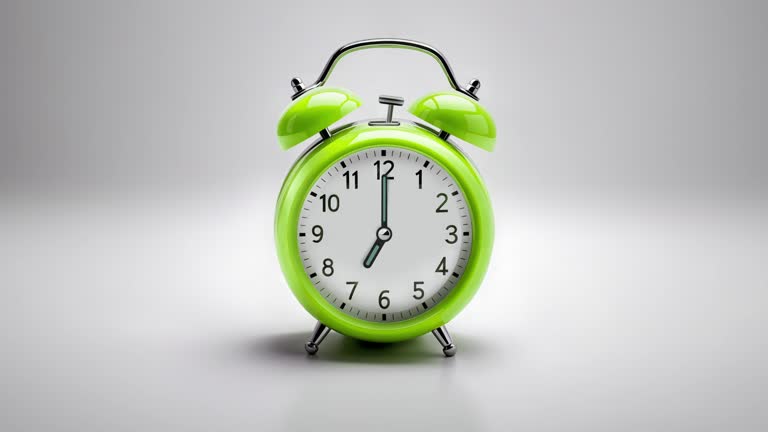 Alarm clock ringing at 07:00 o'clock. It's ticking quickly  on a white background in the studio lights. The concepts of speed, time, deadline, waking up, stress, bell rings, hour, time lapse, schedule, calendar date, finalize, retro style