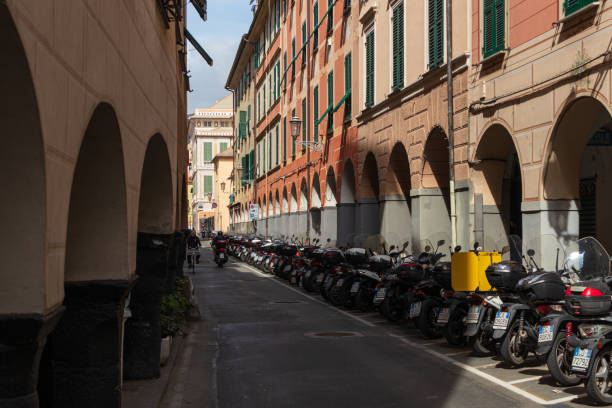 istock Chiavari, Italy - Carruggio con motorini 2150965329
