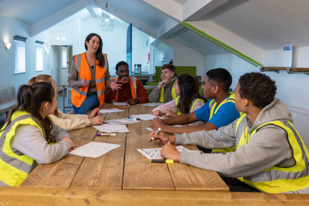 Volunteers Working with a Mentor