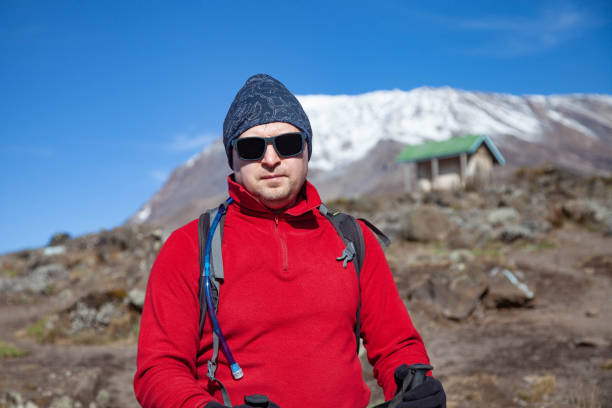Mount Kilimanjaro hiking trail, way to the summit of mount Kili the highest volcano in Africa, Tanzania. View from top of mountain Kilimanjaro. Snow and glacier on top of Kilimanjaro, Mount Kili