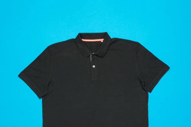 istock Black men's T-shirt on a blue background. 2150967446
