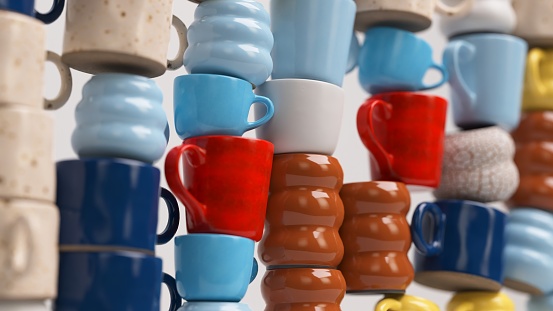 Close-up of stacked colorful coffee mugs 3D render