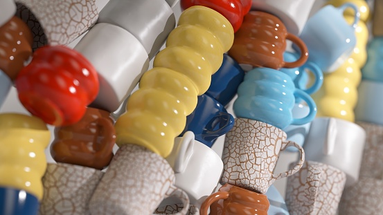 Close-up of colorful textured 3D coffee mugs stacked abstractly