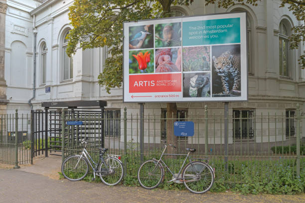 Amsterdam, Netherlands - May 17, 2018: Billboard Poster Sign Artis Amsterdam Royal Zoo and Aquarium Popular Place at Plantage Middenlaan Street.