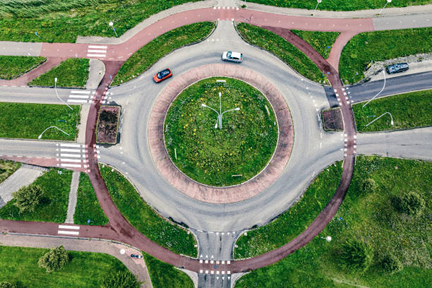 istock Bridge over a lake with traffic on the highway seen from above 2150978530