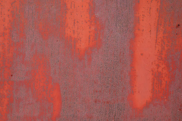 Background. The texture of an old rusty metal plate with uneven paint