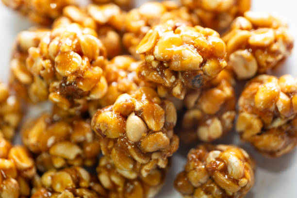 istock A close-up of round, white Chikki peanut balls on a white background 2150980592