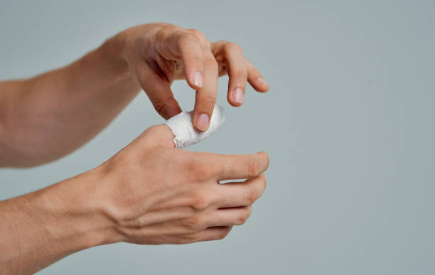 istock bandaged thumb health problems medicine patient isolated background 2150980706