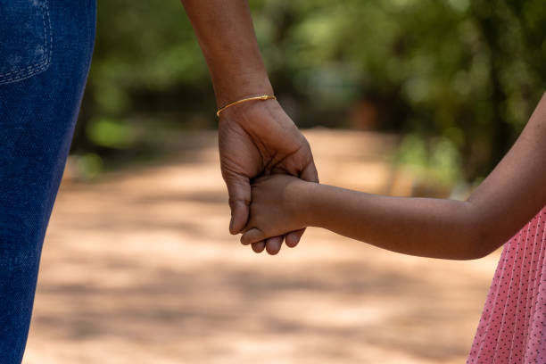 istock Girl's Joyful hold Her Mother hand 2150981882