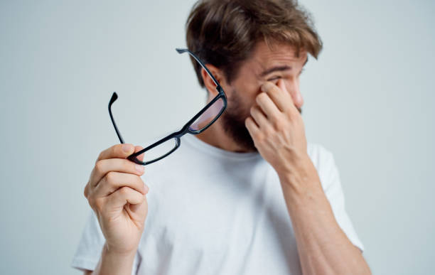 istock bearded man in white t-shirt with glasses vision problems 2150981923